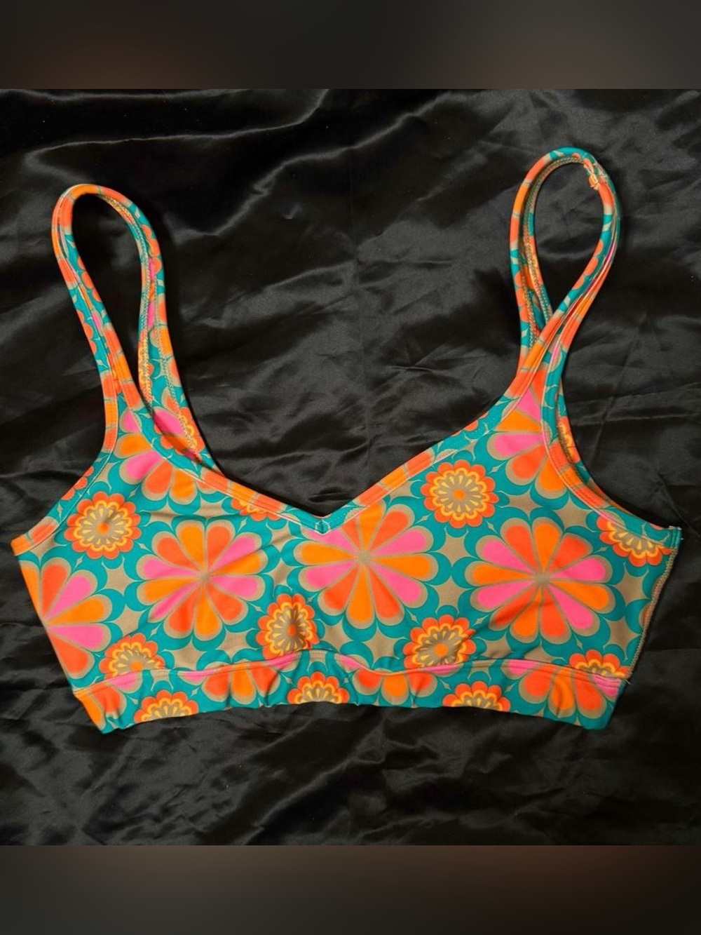 Beyond Yoga psychedelic floral Scoop sports bra in Teal, Orange, Pink